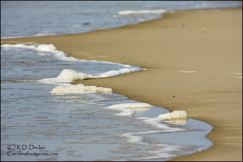 A receding wave leaves it's mark on the pristine beach of Bear Island